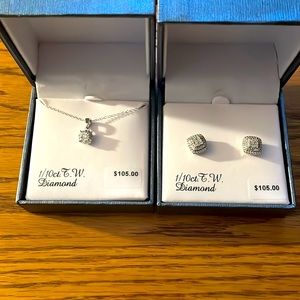 Sterling silver 1/10 ct. diamond stud earrings/matching pendant.